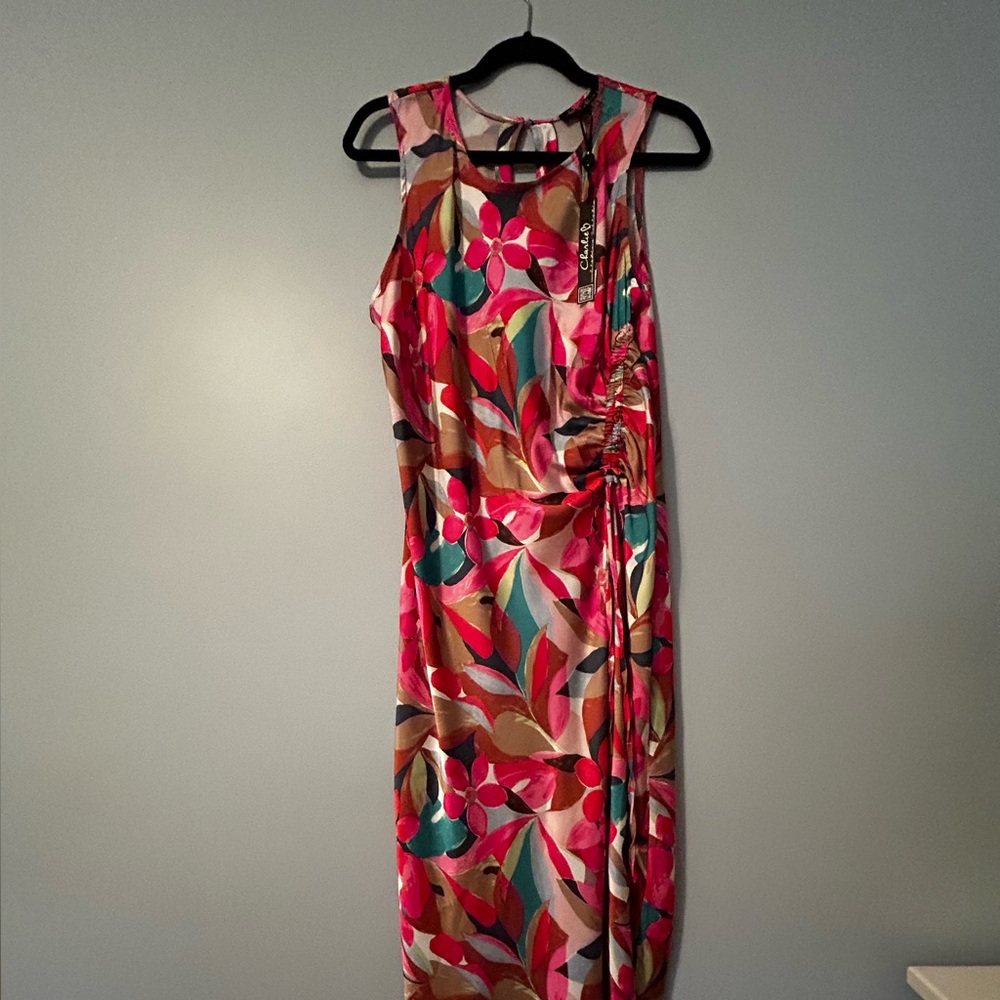Ladies size XL dress.  New with tags.  Poly/Spandex fabric. Very pretty dress